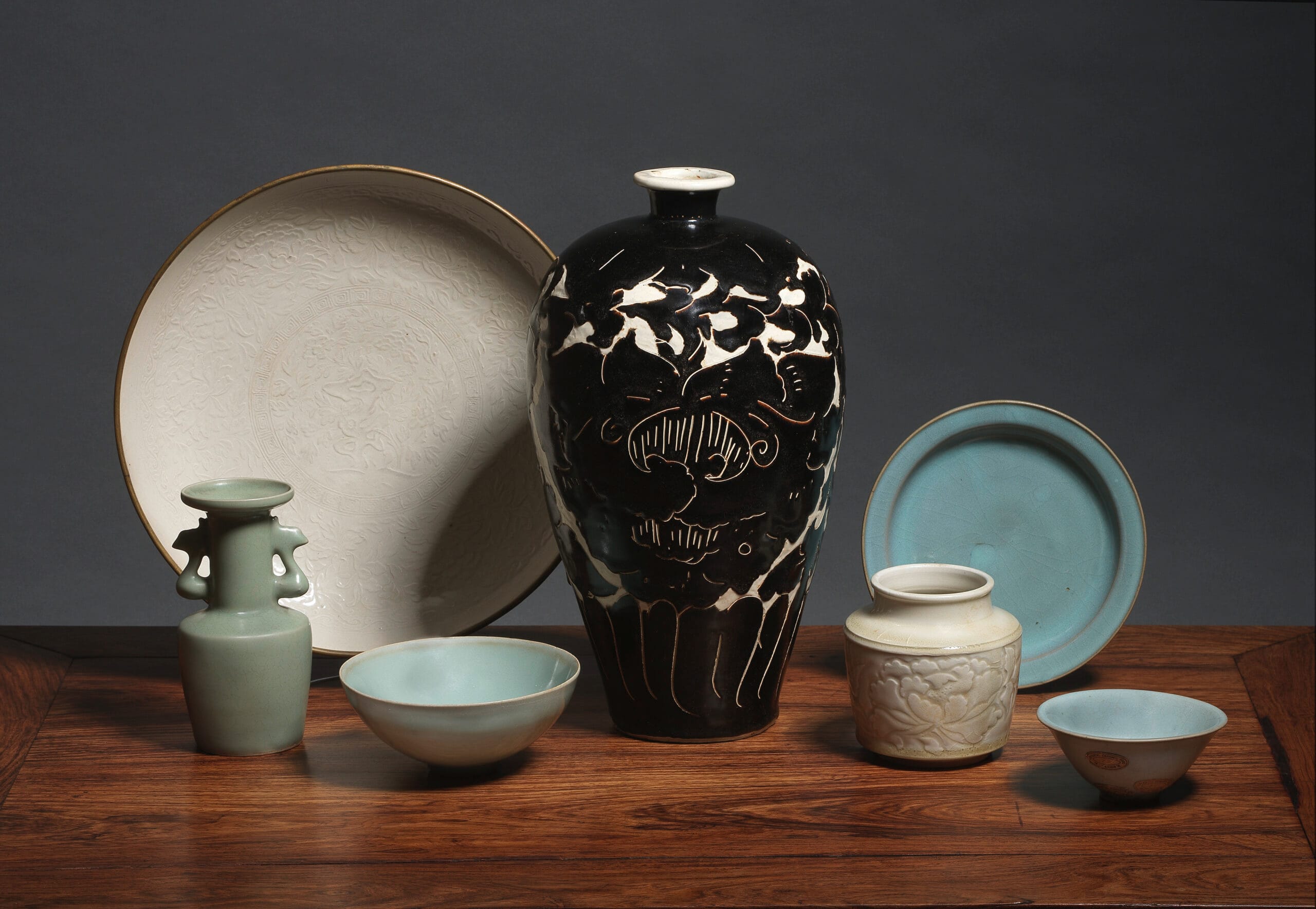 a selection of song ceramics on a table