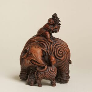 A RARE BAMBOO 'ELEPHANTS AND BOY' GROUP