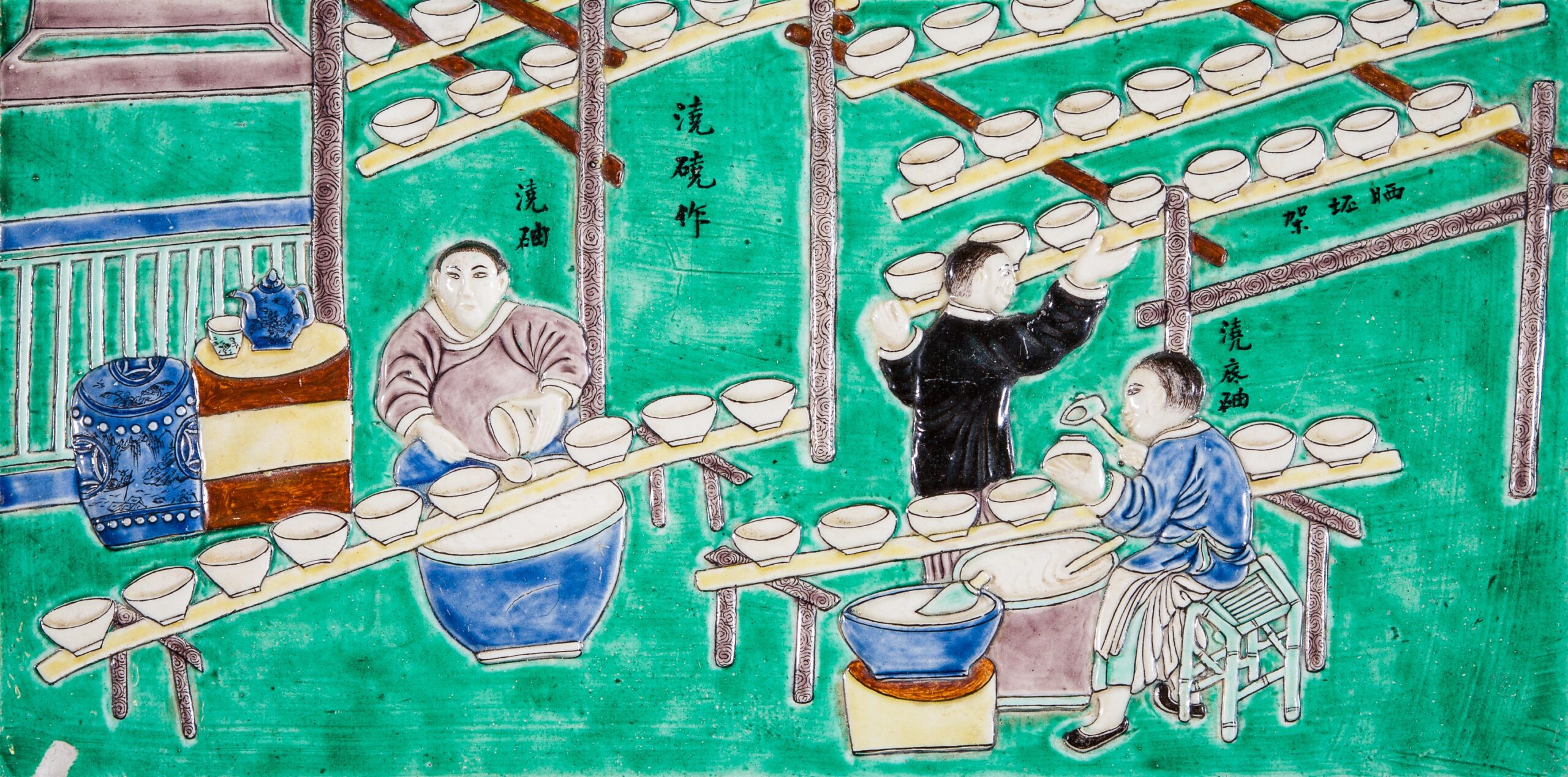 Detail of decoration on a piece of porcelain showing porcelain production